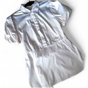 BCBG feminine top cotton has deep V or key hole puffy sleeves, t…